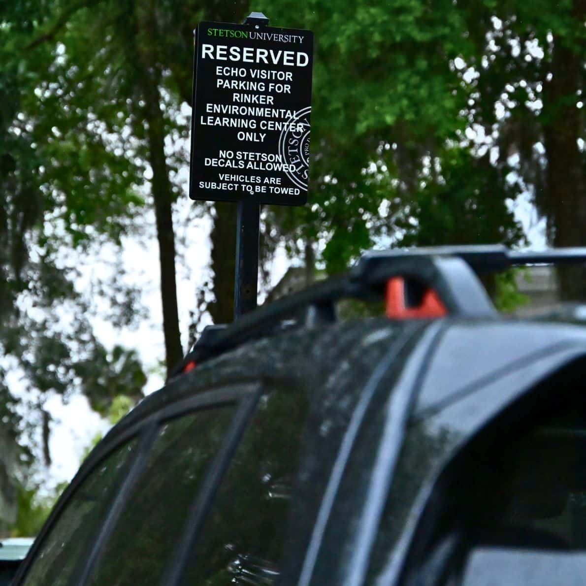 Reserved visitor parking sign for environmental learning center